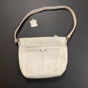 White purse, unknown brand.